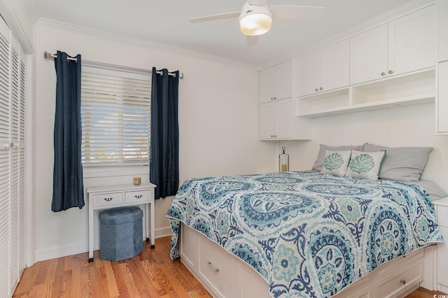 bedroom with light wood finished floors, baseboards, ornamental molding, and a ceiling fan