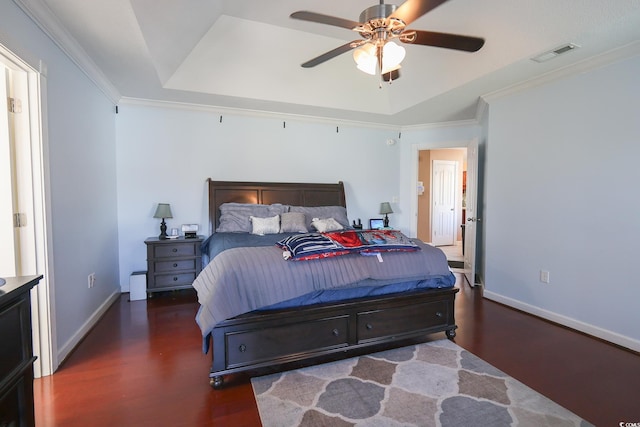 3731 Love Ln, Conway, SC 29527 - bedroom featuring a tray ceiling, crown molding, wood finished floors, and visible vents