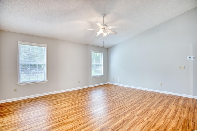 1161 Ganton Way, Myrtle Beach, SC 29588 - empty room featuring light wood-style floors, ceiling fan, plenty of natural light, a textured ceiling, and baseboards