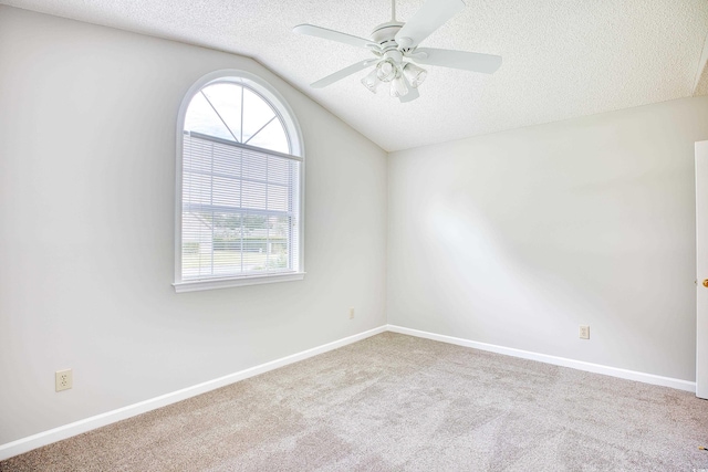 1161 Ganton Way, Myrtle Beach, SC 29588 - carpeted empty room with a textured ceiling, lofted ceiling, a ceiling fan, and baseboards