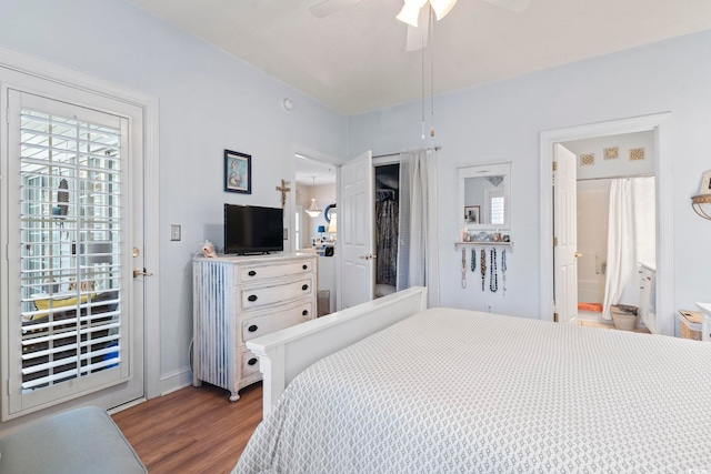 5050 Belleglen Ct Unit 102, Myrtle Beach, SC 29579 - bedroom with baseboards, ceiling fan, and wood finished floors
