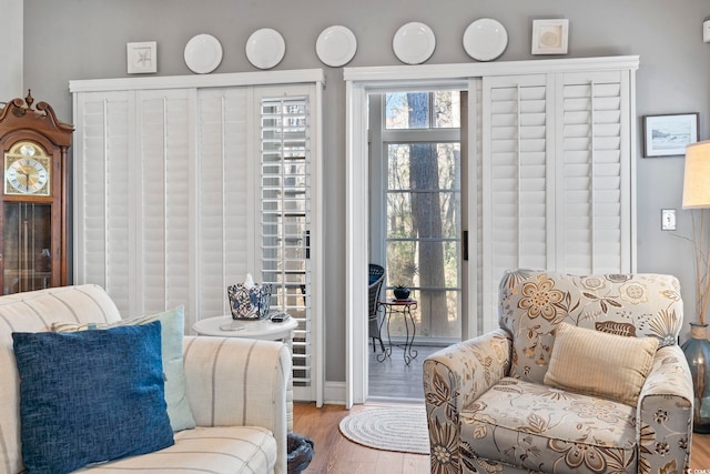 5050 Belleglen Ct Unit 102, Myrtle Beach, SC 29579 - sitting room with plenty of natural light and wood finished floors