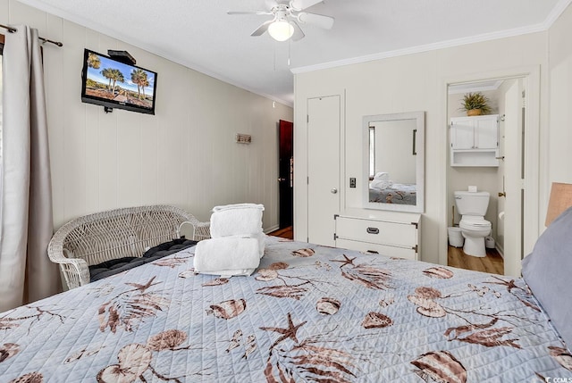 9620 Shore Dr Unit 105, Myrtle Beach, SC 29572 - bedroom featuring ornamental molding, wood finished floors, and connected bathroom