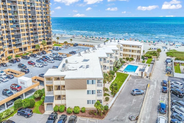 9620 Shore Dr Unit 105, Myrtle Beach, SC 29572 - bird's eye view of a nearby body of water, apartment complex / building, and a pool area