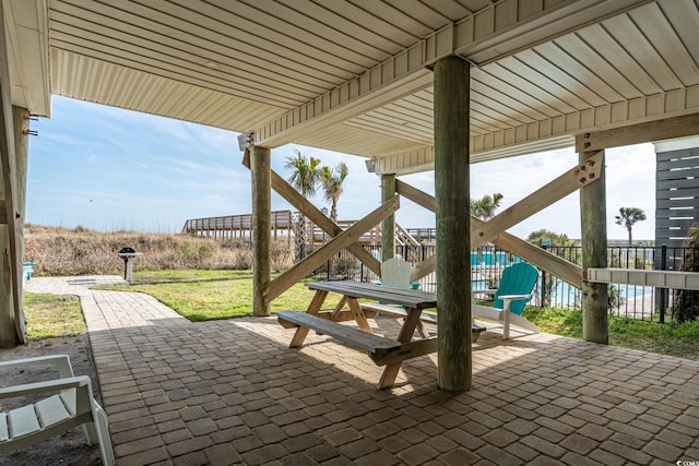 view of patio featuring stairway