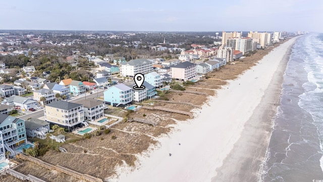 aerial view with a beach view and a water view