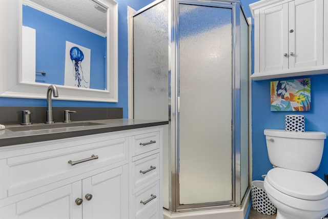 5601 N Ocean Blvd Unit 214B, Myrtle Beach, SC 29577 - bathroom with a stall shower, ornamental molding, toilet, and vanity