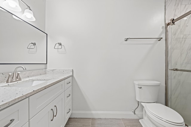 207 Fox Ln, Murrells Inlet, SC 29576 - bathroom featuring toilet, vanity, baseboards, and an enclosed shower