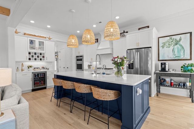 849 Crystal Water Way, Myrtle Beach, SC 29579 - kitchen featuring beverage cooler, tasteful backsplash, appliances with stainless steel finishes, ornamental molding, and white cabinets