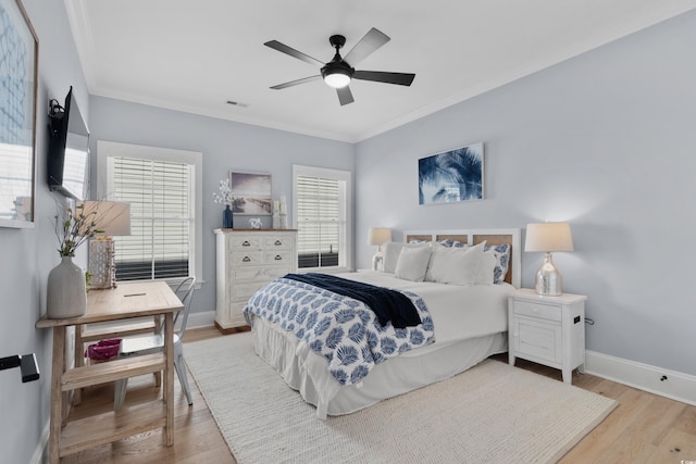 849 Crystal Water Way, Myrtle Beach, SC 29579 - bedroom featuring wood finished floors, crown molding, baseboards, and a ceiling fan