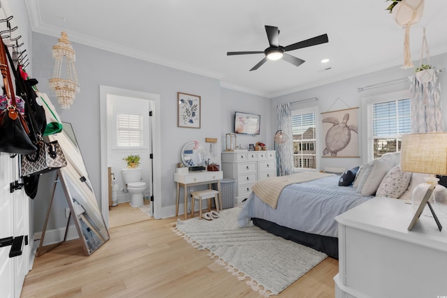 849 Crystal Water Way, Myrtle Beach, SC 29579 - bedroom featuring light wood-type flooring, ornamental molding, baseboards, recessed lighting, and connected bathroom