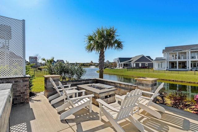 849 Crystal Water Way, Myrtle Beach, SC 29579 - view of patio with a fire pit and a water view