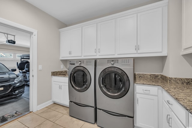 1109 Bonnet Dr, North Myrtle Beach, SC 29582 - washroom with cabinet space, washer and clothes dryer, and light tile patterned floors