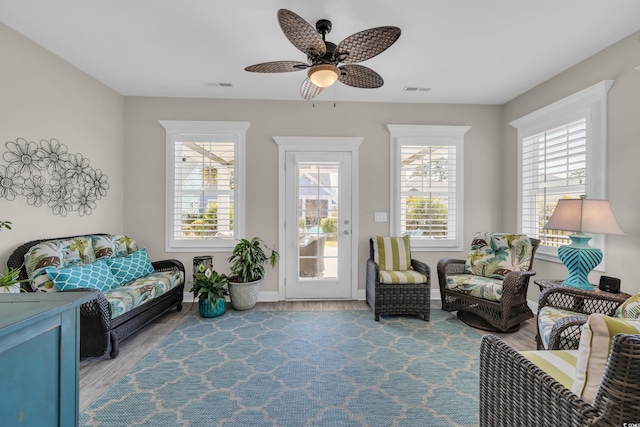 1109 Bonnet Dr, North Myrtle Beach, SC 29582 - living area with plenty of natural light, ceiling fan, and wood finished floors