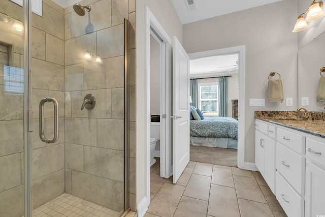 1109 Bonnet Dr, North Myrtle Beach, SC 29582 - full bathroom with vanity, a shower stall, tile patterned floors, and ensuite bath