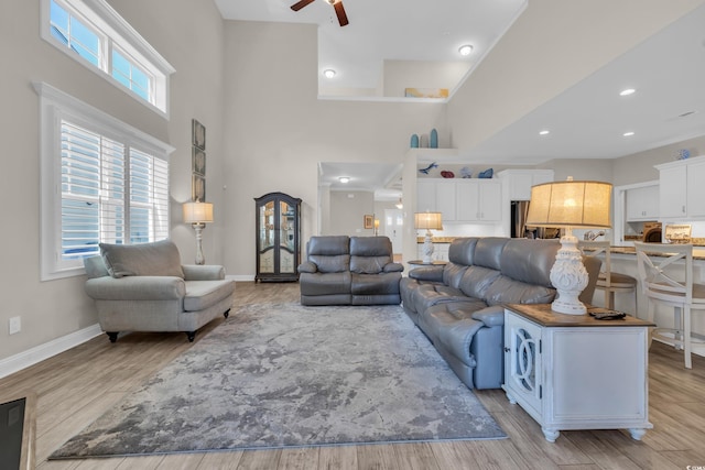 1109 Bonnet Dr, North Myrtle Beach, SC 29582 - living room with a high ceiling, ceiling fan, light wood finished floors, and recessed lighting