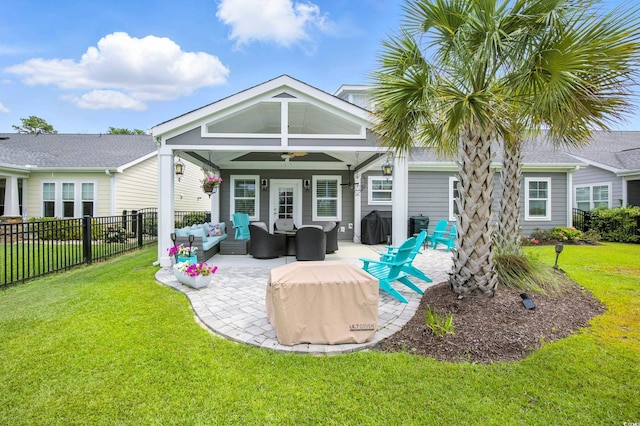 1109 Bonnet Dr, North Myrtle Beach, SC 29582 - rear view of house with outdoor lounge area, ceiling fan, and a patio