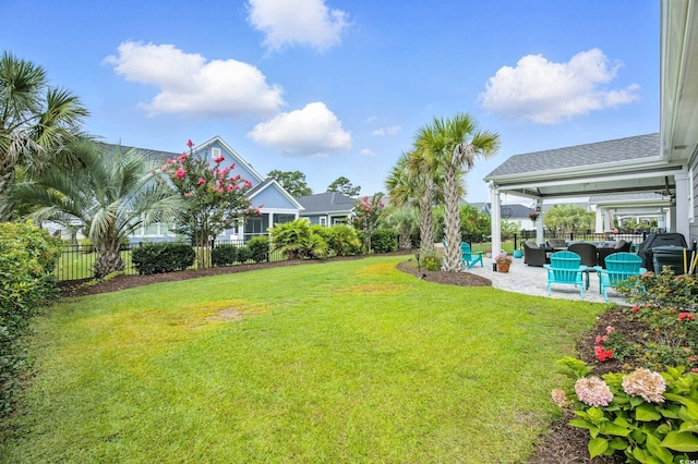 1109 Bonnet Dr, North Myrtle Beach, SC 29582 - view of yard with a patio and an outdoor living space