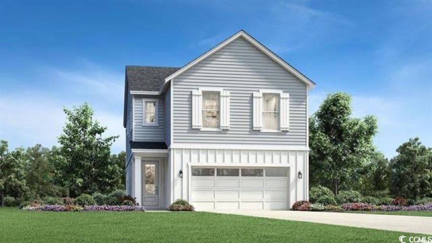 512 9th Ave S, North Myrtle Beach, SC 29582 - view of front of home with an attached garage, a front yard, board and batten siding, and driveway