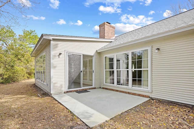 1001 Cardinal Ct, Murrells Inlet, SC 29576 - rear view of property with a patio, a chimney, and a shingled roof