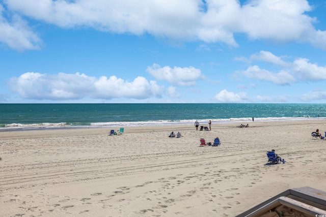 view of water feature with a beach view