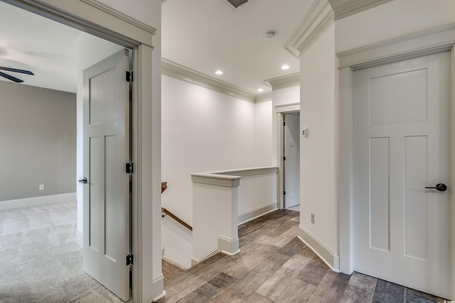6013 Blease Ct, Myrtle Beach, SC 29588 - hallway featuring an upstairs landing, crown molding, recessed lighting, and wood finished floors