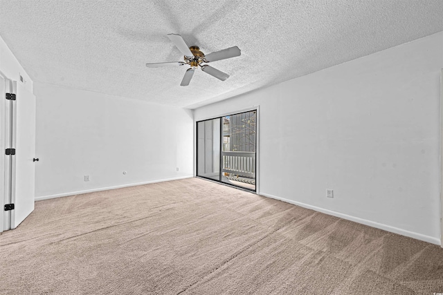 7300 Porcher Dr Unit 11, Myrtle Beach, SC 29572 - carpeted spare room featuring a ceiling fan, a textured ceiling, and baseboards