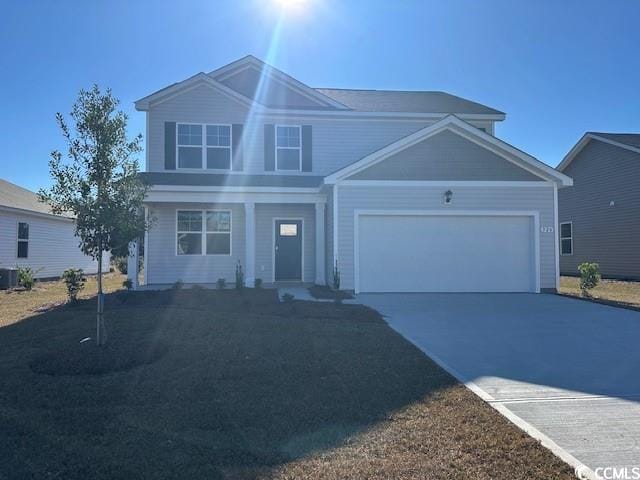 211 Calm Dr, Little River, SC 29566 - traditional-style home featuring concrete driveway and a garage
