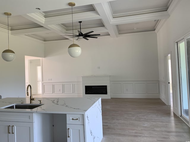 144 Sago Palm Dr, Myrtle Beach, SC 29579 - kitchen featuring a sink, coffered ceiling, a ceiling fan, beam ceiling, and pendant lighting