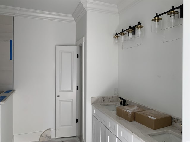 full bathroom featuring crown molding and a sink