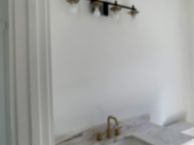 interior details featuring a sink
