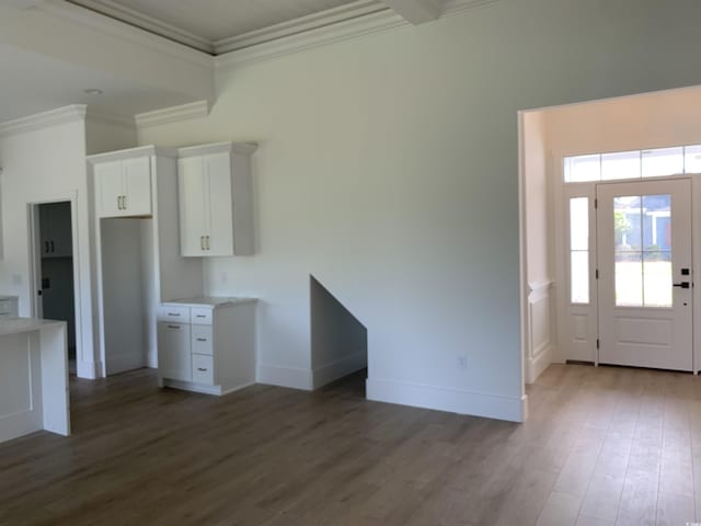 144 Sago Palm Dr, Myrtle Beach, SC 29579 - kitchen featuring wood finished floors, crown molding, white cabinetry, light countertops, and baseboards