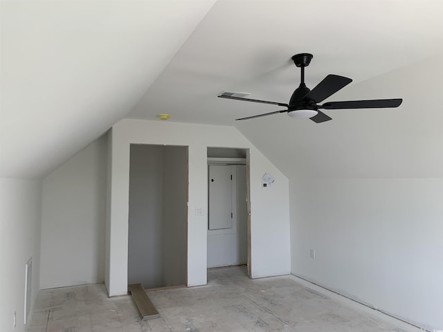 bonus room featuring lofted ceiling, a ceiling fan, and visible vents