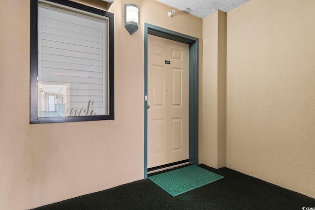 501 S Ocean Blvd Unit 1006, North Myrtle Beach, SC 29582 - doorway to property with stucco siding