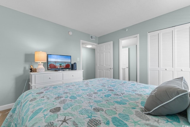 501 S Ocean Blvd Unit 1006, North Myrtle Beach, SC 29582 - bedroom featuring baseboards and a closet