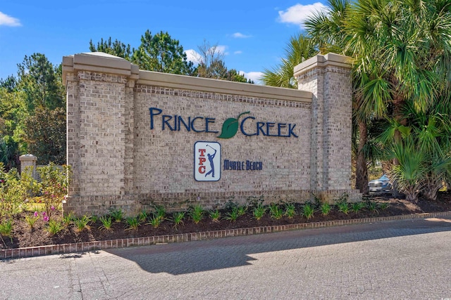 view of community sign