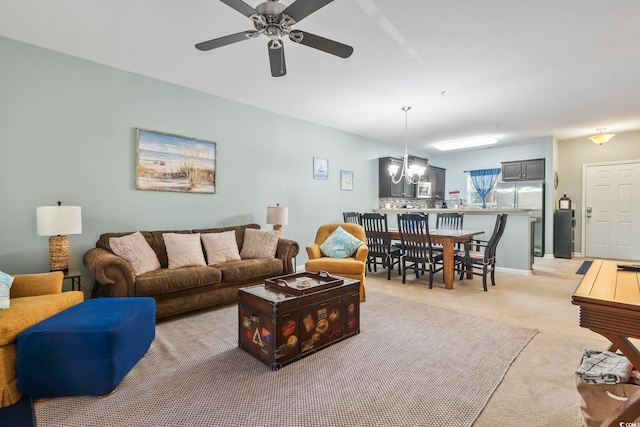 6253 Catalina Dr Unit 713, North Myrtle Beach, SC 29582 - living room with light colored carpet, ceiling fan, and a chandelier