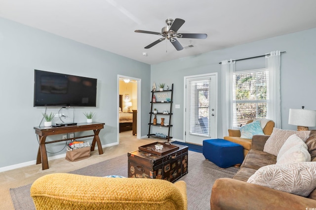 6253 Catalina Dr Unit 713, North Myrtle Beach, SC 29582 - carpeted living area featuring baseboards and ceiling fan