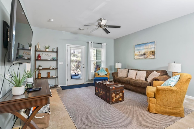 6253 Catalina Dr Unit 713, North Myrtle Beach, SC 29582 - carpeted living area with a ceiling fan and baseboards