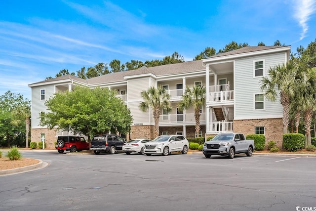 6253 Catalina Dr Unit 713, North Myrtle Beach, SC 29582 - view of building exterior featuring uncovered parking