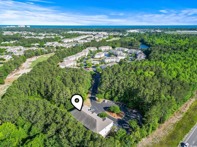 6253 Catalina Dr Unit 713, North Myrtle Beach, SC 29582 - aerial view of property's location with nearby suburban area and a forest