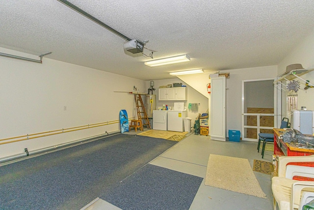 garage featuring separate washer and dryer, a garage door opener, and water heater