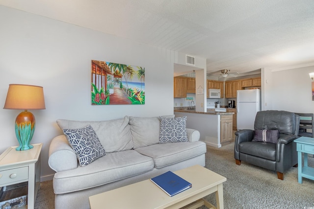 5905 S Kings Hwy Unit 439-B, Myrtle Beach, SC 29577 - living room with a ceiling fan, visible vents, and light colored carpet