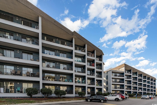 5905 S Kings Hwy Unit 439-B, Myrtle Beach, SC 29577 - view of building exterior with uncovered parking