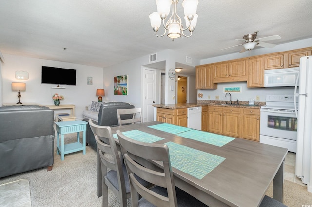 5905 S Kings Hwy Unit 439-B, Myrtle Beach, SC 29577 - dining space with light carpet, ceiling fan with notable chandelier, and visible vents