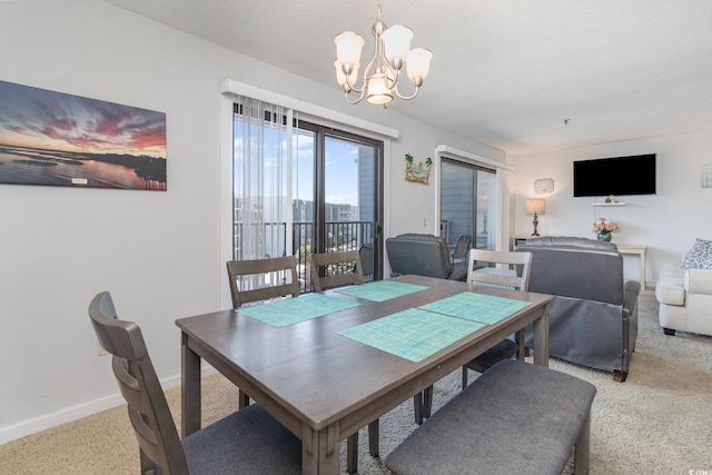 5905 S Kings Hwy Unit 439-B, Myrtle Beach, SC 29577 - dining area with a chandelier and baseboards