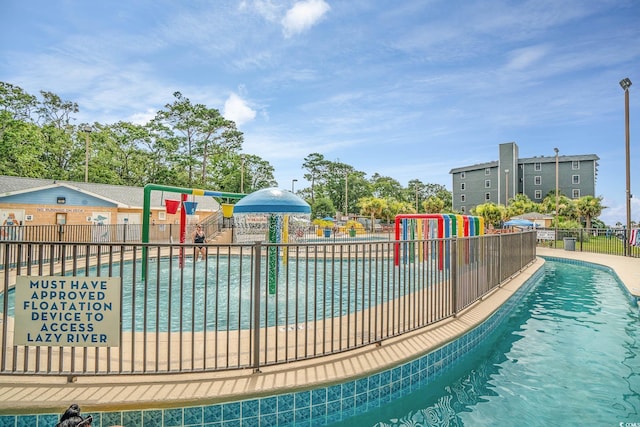 5905 S Kings Hwy Unit 439-B, Myrtle Beach, SC 29577 - pool featuring a water play area and fence