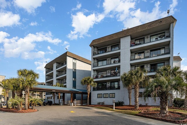 5905 S Kings Hwy Unit 439-B, Myrtle Beach, SC 29577 - view of property with covered parking