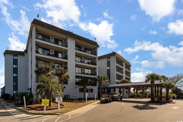 5905 S Kings Hwy Unit 439-B, Myrtle Beach, SC 29577 - view of property featuring a parking lot