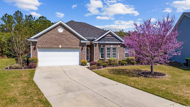 1112 Raven Cliff Ct, Conway, SC 29526 - view of front of home with brick siding, an attached garage, driveway, and a front yard